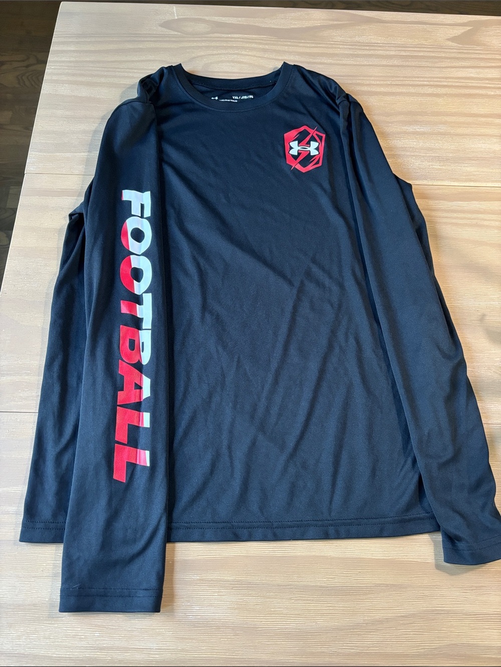 Under Armour Black Long Sleeve Football Tee with Red Logo